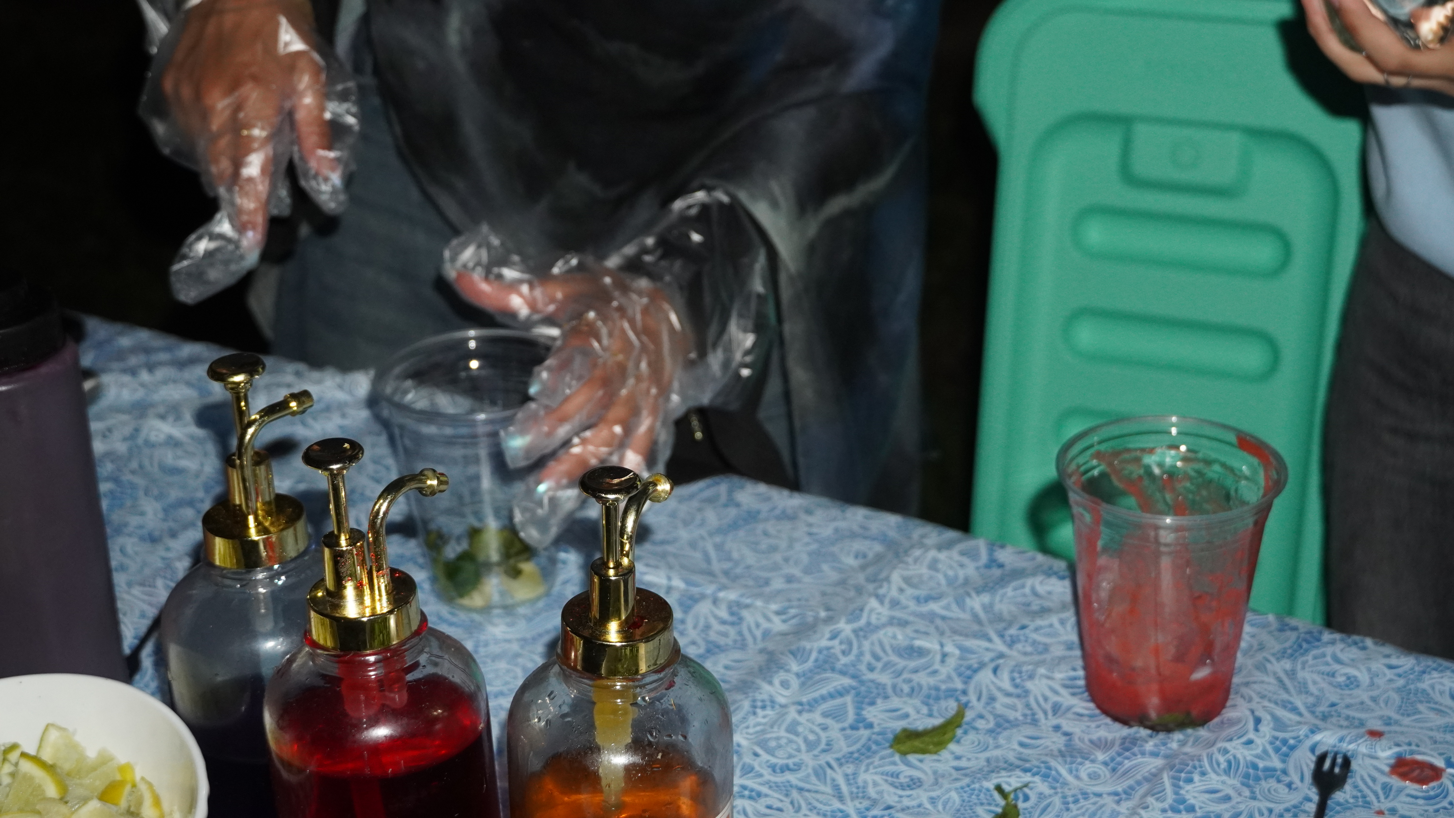 Drink preparation station with fresh ingredients and tools